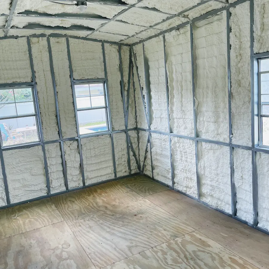 Closed-cell spray foam insulation applied to wall cavities in a residential project in Chatham